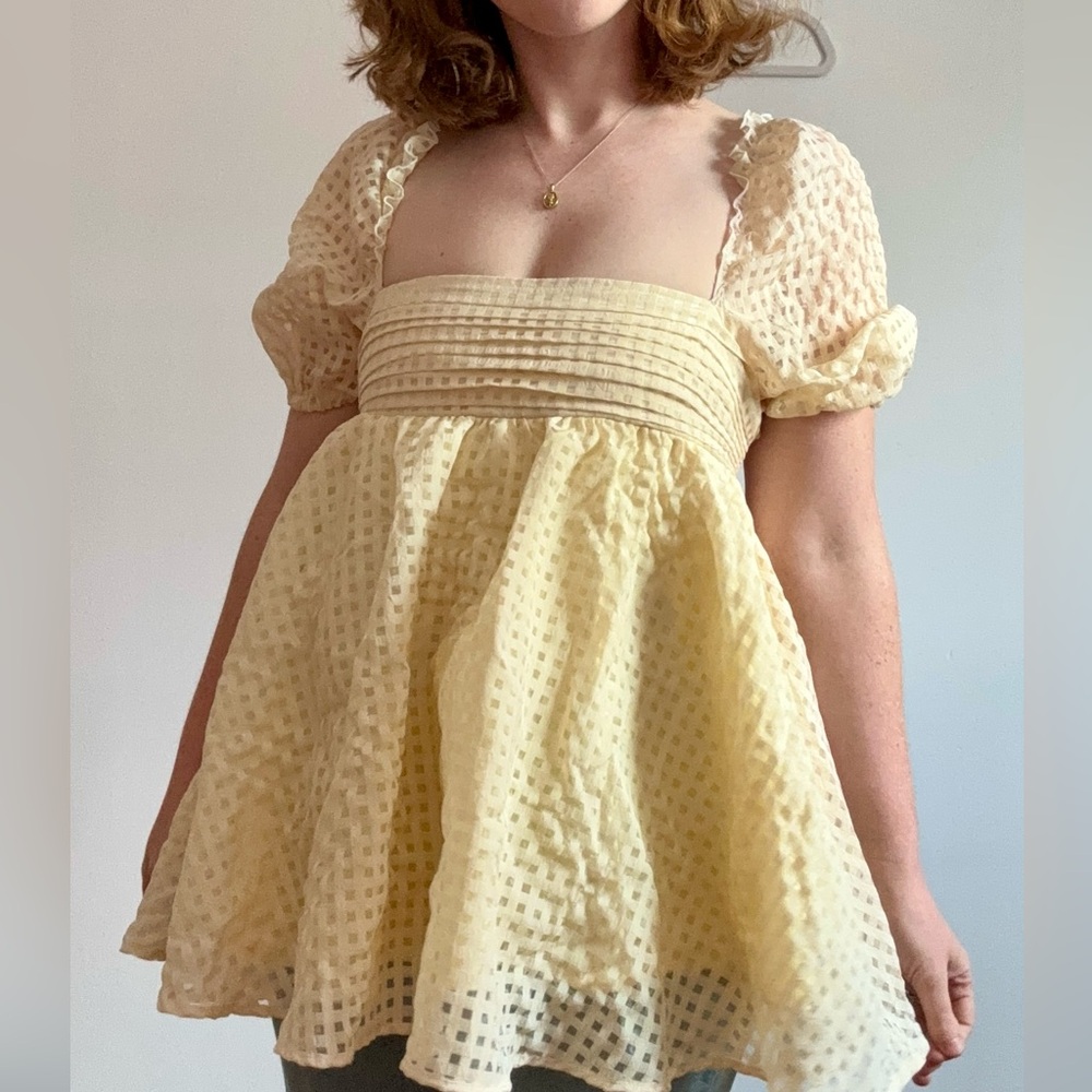 Puff sleeve babydoll top with bow